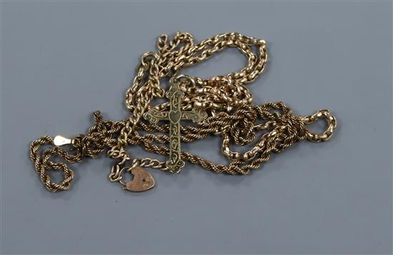 A 9ct gold cross pendant, two 9ct gold chains and a 9ct gold bracelet(a.f.).